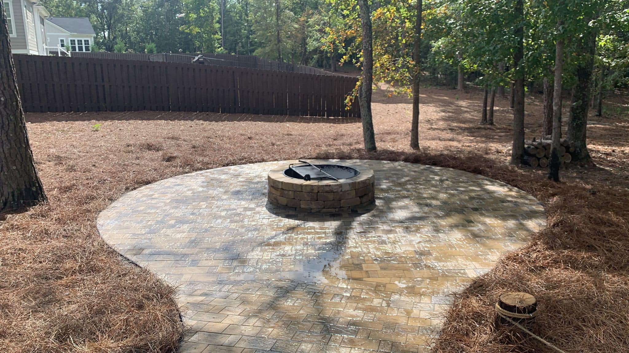 Paver patio and brick fire pit — Southern Nature Landscaping